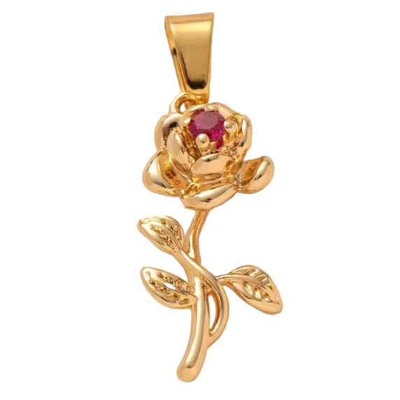 Gold rose-shaped pendant with a red gemstone on a beige background