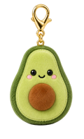 A plush avocado keychain charm with a green outer skin, light green inner flesh, a brown pit, and a cute embroidered face, attached to a gold lobster clasp on a white background.