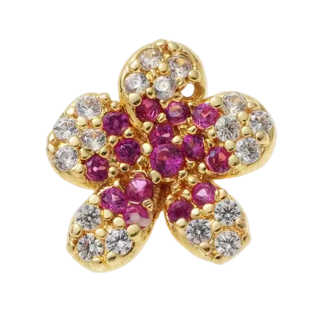 Gold flower-shaped pendant with red and clear gemstones on a white background