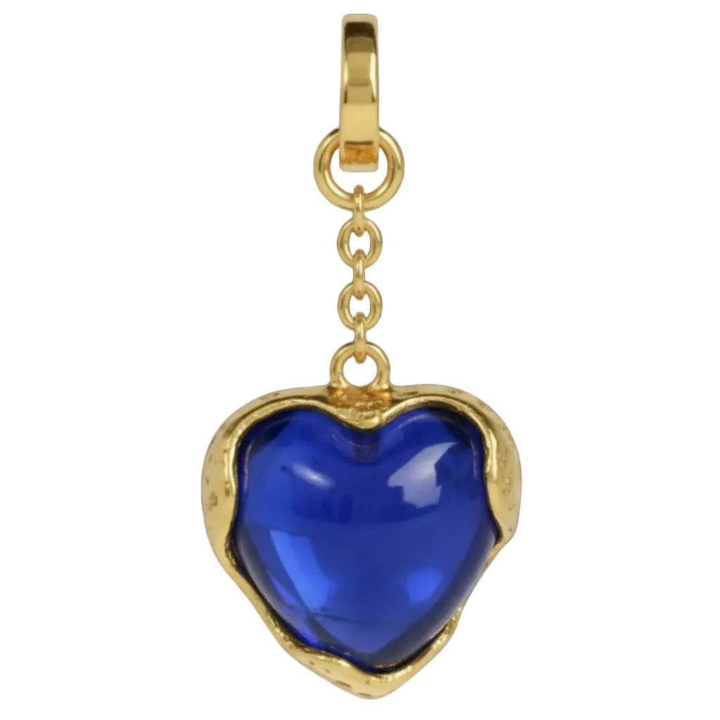 Gold heart-shaped pendant with a blue gemstone on a black background