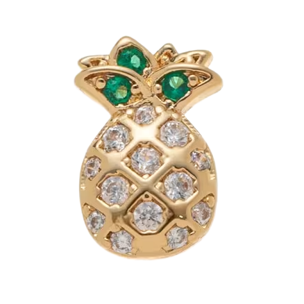 Gold pineapple-shaped jewelry with green and clear stones on a white background